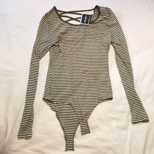 Green and white striped body suit